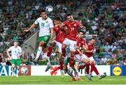 16 October 2023; Jamie McGrath of Republic of Ireland has a header on goal despite the attention of Kian Ronan of Gibraltar, 17, during the UEFA EURO 2024 Championship qualifying group B match between Gibraltar and Republic of Ireland at Estádio Algarve in Faro, Portugal. Photo by Stephen McCarthy/Sportsfile