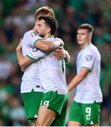 16 October 2023; Mikey Johnston of Republic of Ireland celebrates with teammate Liam Scales, left, after scoring their side's second goal during the UEFA EURO 2024 Championship qualifying group B match between Gibraltar and Republic of Ireland at Estádio Algarve in Faro, Portugal. Photo by Stephen McCarthy/Sportsfile