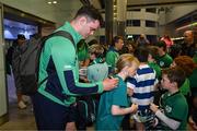 16 October 2023; James Ryan of Ireland signs auographs for supporters at the Ireland rugby teams return to Dublin Airport from the 2023 Rugby World Cup in France. Photo by Piaras Ó Mídheach/Sportsfile