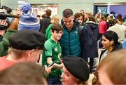 16 October 2023; Captain Jonathan Sexton poses for a selfie with supporters at the Ireland rugby teams return to Dublin Airport from the 2023 Rugby World Cup in France. Photo by Piaras Ó Mídheach/Sportsfile