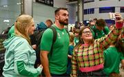 16 October 2023; Rónan Kelleher of Ireland poses for a selfie with a supporter on the Ireland rugby teams arrival at Dublin Airport from the 2023 Rugby World Cup in France. Photo by Piaras Ó Mídheach/Sportsfile