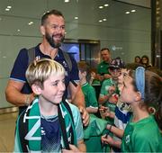 16 October 2023; Young supporters seek autographs from Ireland head coach Andy Farrell on the teams return to Dublin Airport from the 2023 Rugby World Cup in Paris, France. Photo by Piaras Ó Mídheach/Sportsfile