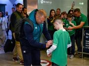16 October 2023; Keith Earls of Ireland signs an autograph for a young supporter on the Ireland rugby teams return to Dublin Airport from the 2023 Rugby World Cup in Paris, France. Photo by Piaras Ó Mídheach/Sportsfile
