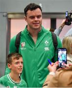 16 October 2023; James Ryan of Ireland poses for a photo with a supporter on the Ireland rugby teams arrival at Dublin Airport from the 2023 Rugby World Cup in Paris, France. Photo by Piaras Ó Mídheach/Sportsfile