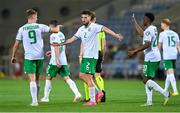 16 October 2023; Matt Doherty of Republic of Ireland, centre, is congratulated by teammates Evan Ferguson, left, and Chiedozie Ogbene after scoring their side's third goal during the UEFA EURO 2024 Championship qualifying group B match between Gibraltar and Republic of Ireland at Estádio Algarve in Faro, Portugal. Photo by Seb Daly/Sportsfile