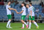 16 October 2023; Matt Doherty of Republic of Ireland, second from left, celebrates with teammates, from left, Shane Duffy, Liam Scales and Evan Ferguson after scoring their side's third goal during the UEFA EURO 2024 Championship qualifying group B match between Gibraltar and Republic of Ireland at Estádio Algarve in Faro, Portugal. Photo by Seb Daly/Sportsfile