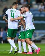 16 October 2023; Matt Doherty of Republic of Ireland, right, celebrates with teammates, Shane Duffy, left, and Ryan Manning after scoring their side's third goal during the UEFA EURO 2024 Championship qualifying group B match between Gibraltar and Republic of Ireland at Estádio Algarve in Faro, Portugal. Photo by Seb Daly/Sportsfile