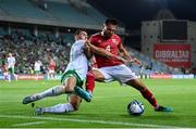 16 October 2023; John Sergeant of Gibraltar in action against Jamie McGrath of Republic of Ireland during the UEFA EURO 2024 Championship qualifying group B match between Gibraltar and Republic of Ireland at Estádio Algarve in Faro, Portugal. Photo by Stephen McCarthy/Sportsfile
