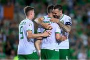 16 October 2023; Matt Doherty of Republic of Ireland, 2, celebrates with teammates, from left, Evan Ferguson and Shane Duffy after scoring their side's third goal during the UEFA EURO 2024 Championship qualifying group B match between Gibraltar and Republic of Ireland at Estádio Algarve in Faro, Portugal. Photo by Stephen McCarthy/Sportsfile