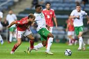 16 October 2023; Chiedozie Ogbene of Republic of Ireland in action against Ethan Britto of Gibraltar during the UEFA EURO 2024 Championship qualifying group B match between Gibraltar and Republic of Ireland at Estádio Algarve in Faro, Portugal. Photo by Seb Daly/Sportsfile