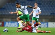 16 October 2023; Adam Idah of Republic of Ireland and Liam Walker of Gibraltar during the UEFA EURO 2024 Championship qualifying group B match between Gibraltar and Republic of Ireland at Estádio Algarve in Faro, Portugal. Photo by Stephen McCarthy/Sportsfile