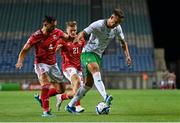 16 October 2023; Callum Robinson of Republic of Ireland in action against John Sergeant, left, and Jamie Coombes of Gibraltar during the UEFA EURO 2024 Championship qualifying group B match between Gibraltar and Republic of Ireland at Estádio Algarve in Faro, Portugal. Photo by Stephen McCarthy/Sportsfile