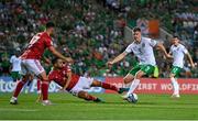 16 October 2023; Evan Ferguson of Republic of Ireland in action against John Sergeant of Gibraltar during the UEFA EURO 2024 Championship qualifying group B match between Gibraltar and Republic of Ireland at Estádio Algarve in Faro, Portugal. Photo by Stephen McCarthy/Sportsfile