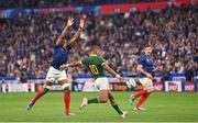 15 October 2023; Manie Libbok of South Africa kicks clear under pressure from Cameron Woki of France during the 2023 Rugby World Cup quarter-final match between France and South Africa at the Stade de France in Paris, France. Photo by Ramsey Cardy/Sportsfile