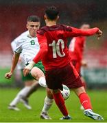 17 October 2023; Matthew Moore of Republic of Ireland is tackled by Zidan Tairi of Switzerland during the UEFA European U17 Championship qualifying round 10 match between Switzerland and Republic of Ireland at Turner's Cross in Cork. Photo by Eóin Noonan/Sportsfile
