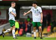 17 October 2023; Rory Finneran of Republic of Ireland, centre, and team-mate Harry McGlinchey during the UEFA European U17 Championship qualifying group 10 match between Switzerland and Republic of Ireland at Turner's Cross in Cork. Photo by Eóin Noonan/Sportsfile