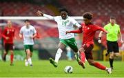 17 October 2023; Marvin Akahomen of Switzerland in action against Jayden Umeh of Republic of Ireland during the UEFA European U17 Championship qualifying group 10 match between Switzerland and Republic of Ireland at Turner's Cross in Cork. Photo by Eóin Noonan/Sportsfile