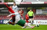 17 October 2023; Kaylem Harnett of Republic of Ireland has an attempt on goal despite the efforts of Leart Kabashi of Switzerland during the UEFA European U17 Championship qualifying group 10 match between Switzerland and Republic of Ireland at Turner's Cross in Cork. Photo by Eóin Noonan/Sportsfile