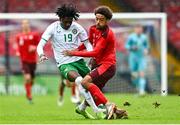 17 October 2023; Jayden Umeh of Republic of Ireland is tackled by Marvin Akahomen of Switzerland during the UEFA European U17 Championship qualifying group 10 match between Switzerland and Republic of Ireland at Turner's Cross in Cork. Photo by Eóin Noonan/Sportsfile