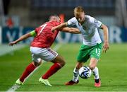 16 October 2023; Mark Sykes of Republic of Ireland in action against Lee Casciaro of Gibraltar during the UEFA EURO 2024 Championship qualifying group B match between Gibraltar and Republic of Ireland at Estádio Algarve in Faro, Portugal. Photo by Seb Daly/Sportsfile