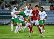 16 October 2023; Jamie McGrath of Republic of Ireland flicks the ball on under pressure from Gibraltar's Nicholas Pozo to assist teammate Matt Doherty, not pictured, to score their side's third goal during the UEFA EURO 2024 Championship qualifying group B match between Gibraltar and Republic of Ireland at Estádio Algarve in Faro, Portugal. Photo by Seb Daly/Sportsfile