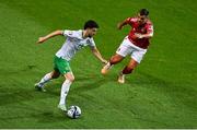 16 October 2023; Mikey Johnston of Republic of Ireland in action against Liam Walker of Gibraltar during the UEFA EURO 2024 Championship qualifying group B match between Gibraltar and Republic of Ireland at Estádio Algarve in Faro, Portugal. Photo by Seb Daly/Sportsfile