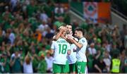 16 October 2023; Callum Robinson of Republic of Ireland is congratulated by team-mates, from left, Jamie McGrath, 18, Shane Duffy and Jayson Molumby after scoring their side's fourth goal during the UEFA EURO 2024 Championship qualifying group B match between Gibraltar and Republic of Ireland at Estádio Algarve in Faro, Portugal. Photo by Stephen McCarthy/Sportsfile