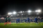 17 October 2023; The referees warm up before the UEFA EURO 2024 Championship qualifying group H match between Northern Ireland and Slovenia at the National Football Stadium at Windsor Park in Belfast. Photo by Ramsey Cardy/Sportsfile