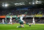 17 October 2023; Jaka Bijol of Slovenia is tackled by Brad Lyons  of Northern Ireland during the UEFA EURO 2024 Championship qualifying group H match between Northern Ireland and Slovenia at the National Football Stadium at Windsor Park in Belfast. Photo by Ramsey Cardy/Sportsfile
