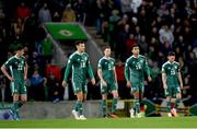 17 October 2023; Northern Ireland players, from left, Eoin Toal, Brad Lyons, Jonny Evans, Shea Charles and Jordan Thompson react during the UEFA EURO 2024 Championship qualifying group H match between Northern Ireland and Slovenia at the National Football Stadium at Windsor Park in Belfast. Photo by Ramsey Cardy/Sportsfile