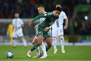 17 October 2023; Shea Charles of Northern Ireland in action against Timi Elšnik of Slovenia during the UEFA EURO 2024 Championship qualifying group H match between Northern Ireland and Slovenia at the National Football Stadium at Windsor Park in Belfast. Photo by Ramsey Cardy/Sportsfile