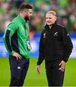 14 October 2023; Robbie Henshaw of Ireland, left, and New Zealand assistant coach Joe Schmidt after the 2023 Rugby World Cup quarter-final match between Ireland and New Zealand at the Stade de France in Paris, France. Photo by Brendan Moran/Sportsfile