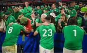 14 October 2023; Ireland players, from left, Caelan Doris, Jimmy O'Brien and Andrew Porter are consoled by family after their side's defeat in the 2023 Rugby World Cup quarter-final match between Ireland and New Zealand at the Stade de France in Paris, France. Photo by Brendan Moran/Sportsfile