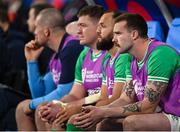 14 October 2023; Ireland players, from right, Mack Hansen, Jamison Gibson-Park and Tadhg Furlong look on from the bench during the 2023 Rugby World Cup quarter-final match between Ireland and New Zealand at the Stade de France in Paris, France. Photo by Brendan Moran/Sportsfile