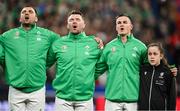 14 October 2023; Ireland players, from left, Tadhg Beirne, Peter O’Mahony and captain Jonathan Sexton stand for the national anthems before the 2023 Rugby World Cup quarter-final match between Ireland and New Zealand at the Stade de France in Paris, France. Photo by Brendan Moran/Sportsfile