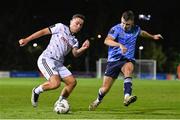 12 October 2023; John O’Sullivan of Bohemians and Adam Wells of UCD during the SSE Airtricity Men's Premier Division match between UCD and Bohemians at UCD Bowl in Dublin. Photo by Ben McShane/Sportsfile