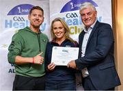 20 October 2023; The GAA is thrilled to announce and honor GAA clubs with the official &quot;Healthy Club&quot; designation. In recent years, Leinster clubs have actively taken part in the GAA's prominent Healthy Clubs pilot program, generously supported by Irish Life. Pictured are Darren Geoghegan and Sheila Dunne of the Portarlington club in Laois being presented with their foundation award by Leinster Council health and wellbeing chairperson Dave Murray at the Killeshin Hotel in Portlaoise, Laois. Photo by Brendan Moran/Sportsfile