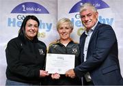 20 October 2023; The GAA is thrilled to announce and honor GAA clubs with the official &quot;Healthy Club&quot; designation. In recent years, Leinster clubs have actively taken part in the GAA's prominent Healthy Clubs pilot program, generously supported by Irish Life. Pictured are Pauline Dooley and Fiona Dooley of the Seir Kieran club in Offaly being presented with their silver award by Leinster Council health and wellbeing chairperson Dave Murray at the Killeshin Hotel in Portlaoise, Laois. Photo by Brendan Moran/Sportsfile