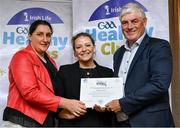 20 October 2023; The GAA is thrilled to announce and honor GAA clubs with the official &quot;Healthy Club&quot; designation. In recent years, Leinster clubs have actively taken part in the GAA's prominent Healthy Clubs pilot program, generously supported by Irish Life. Pictured are Grainne Dowd and Anne Darcy of the Dunderry club in Meath being presented with their silver award by Leinster Council health and wellbeing chairperson Dave Murray at the Killeshin Hotel in Portlaoise, Laois. Photo by Brendan Moran/Sportsfile