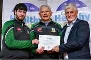20 October 2023; The GAA is thrilled to announce and honor GAA clubs with the official &quot;Healthy Club&quot; designation. In recent years, Leinster clubs have actively taken part in the GAA's prominent Healthy Clubs pilot program, generously supported by Irish Life. Pictured are Ben Walsh Smith and Tom Walsh of the Milltown club in Westmeath being presented with their foundation award by Leinster Council health and wellbeing chairperson Dave Murray at the Killeshin Hotel in Portlaoise, Laois. Photo by Brendan Moran/Sportsfile