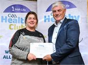 20 October 2023; The GAA is thrilled to announce and honor GAA clubs with the official &quot;Healthy Club&quot; designation. In recent years, Leinster clubs have actively taken part in the GAA's prominent Healthy Clubs pilot program, generously supported by Irish Life. Pictured is Elaine Kavanagh of the Mount Leinster Rangers GAA in Carlow being presented with their silver award by Leinster Council health and wellbeing chairperson Dave Murray at the Killeshin Hotel in Portlaoise, Laois. Photo by Brendan Moran/Sportsfile