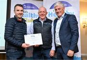 20 October 2023; The GAA is thrilled to announce and honor GAA clubs with the official &quot;Healthy Club&quot; designation. In recent years, Leinster clubs have actively taken part in the GAA's prominent Healthy Clubs pilot program, generously supported by Irish Life. Pictured are Peter Cleere and Sean Farrell of the Grange club in Carlow being presented with their silver award by Leinster Council health and wellbeing chairperson Dave Murray at the Killeshin Hotel in Portlaoise, Laois. Photo by Brendan Moran/Sportsfile