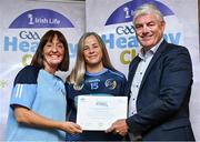 20 October 2023; The GAA is thrilled to announce and honor GAA clubs with the official &quot;Healthy Club&quot; designation. In recent years, Leinster clubs have actively taken part in the GAA's prominent Healthy Clubs pilot program, generously supported by Irish Life. Pictured are Annette Reilly and Sara Reilly of the Na Gaeil Óga club in Dublin being presented with their foundation award by Leinster Council health and wellbeing chairperson Dave Murray at the Killeshin Hotel in Portlaoise, Laois. Photo by Brendan Moran/Sportsfile