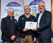 20 October 2023; The GAA is thrilled to announce and honor GAA clubs with the official &quot;Healthy Club&quot; designation. In recent years, Leinster clubs have actively taken part in the GAA's prominent Healthy Clubs pilot program, generously supported by Irish Life. Pictured are Lar Cooke and Bob Donnelly of the Robertstown club in Kildare being presented with their foundation award by Leinster Council health and wellbeing chairperson Dave Murray at the Killeshin Hotel in Portlaoise, Laois. Photo by Brendan Moran/Sportsfile