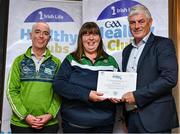 20 October 2023; The GAA is thrilled to announce and honor GAA clubs with the official &quot;Healthy Club&quot; designation. In recent years, Leinster clubs have actively taken part in the GAA's prominent Healthy Clubs pilot program, generously supported by Irish Life. Pictured are Ralph Jordan and Michelle Mooney of the St Fechins club in Louth being presented with their silver award by Leinster Council health and wellbeing chairperson Dave Murray at the Killeshin Hotel in Portlaoise, Laois. Photo by Brendan Moran/Sportsfile