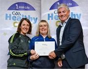 20 October 2023; The GAA is thrilled to announce and honor GAA clubs with the official &quot;Healthy Club&quot; designation. In recent years, Leinster clubs have actively taken part in the GAA's prominent Healthy Clubs pilot program, generously supported by Irish Life. Pictured are Michelle Richardson and Karen Richardson of the Blessington club in Wicklow being presented with their gold award by Leinster Council health and wellbeing chairperson Dave Murray at the Killeshin Hotel in Portlaoise, Laois. Photo by Brendan Moran/Sportsfile