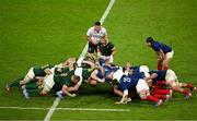 15 October 2023; Faf de Klerk of South Africa prepares to put the ball into a scrum, watched by referee Ben O'Keeffe and Antoine Dupont of France during the 2023 Rugby World Cup quarter-final match between France and South Africa at the Stade de France in Paris, France. Photo by Brendan Moran/Sportsfile