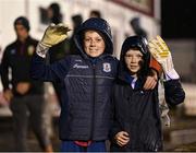 20 October 2023; Galway United supporters Oísín Carr, left, and Cian Parker, both age 11, after they were gifted with gloves by Galway United goalkeeper Alex Rutter before the SSE Airtricity Men's First Division match between Galway United and Wexford at Eamonn Deacy Park in Galway. Photo by Stephen McCarthy/Sportsfile
