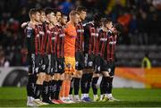 20 October 2023; Bohemians players stand for a minutes silence before the SSE Airtricity Men's Premier Division match between Bohemians and St Patrick's Athletic at Dalymount Park in Dublin. Photo by Seb Daly/Sportsfile
