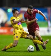 20 October 2023; Ed McCarthy of Galway United in action against Aaron Doran of Wexford during the SSE Airtricity Men's First Division match between Galway United and Wexford at Eamonn Deacy Park in Galway. Photo by Stephen McCarthy/Sportsfile